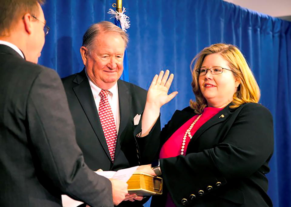 U.S. Office of Management and Budget Director Mick Mulvaney swears in U.S. General Services Administration (GSA) Administrator Emily W. Murphy in Washington, U.S. December 5, 2017. Picture taken December 5, 2017.  GSA/Handout via REUTERS.  THIS IMAGE HAS BEEN SUPPLIED BY A THIRD PARTY.