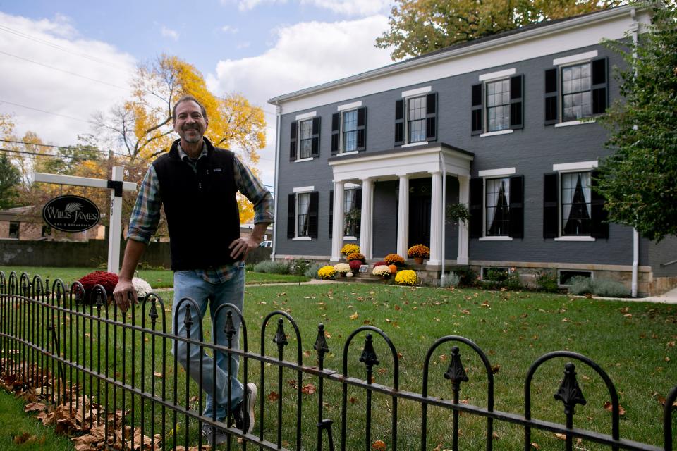 Drew Musser, owner, stands in front of The Willis-James Bed and Breakfast on October 18, 2023, in Chillicothe, Ohio.