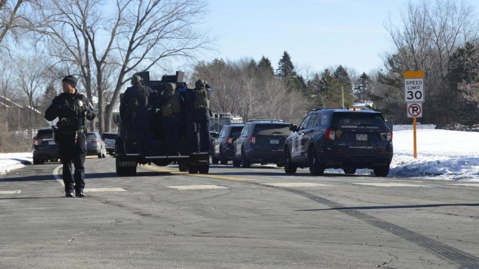 PHOTO: Law enforcement officers attend the scene of an incident in which police officers were killed while responding to an emergency call, according to local media, in Burnsville, Minn., Feb. 18, 2024, in this picture obtained from social media.  (MN CRIME/MNCRIME.COM via Reuters)