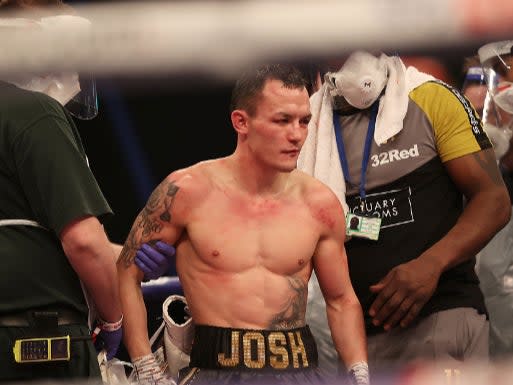 <p>Josh Warrington reacts after his shock defeat</p> (Mark Robinson Matchroom Boxing)