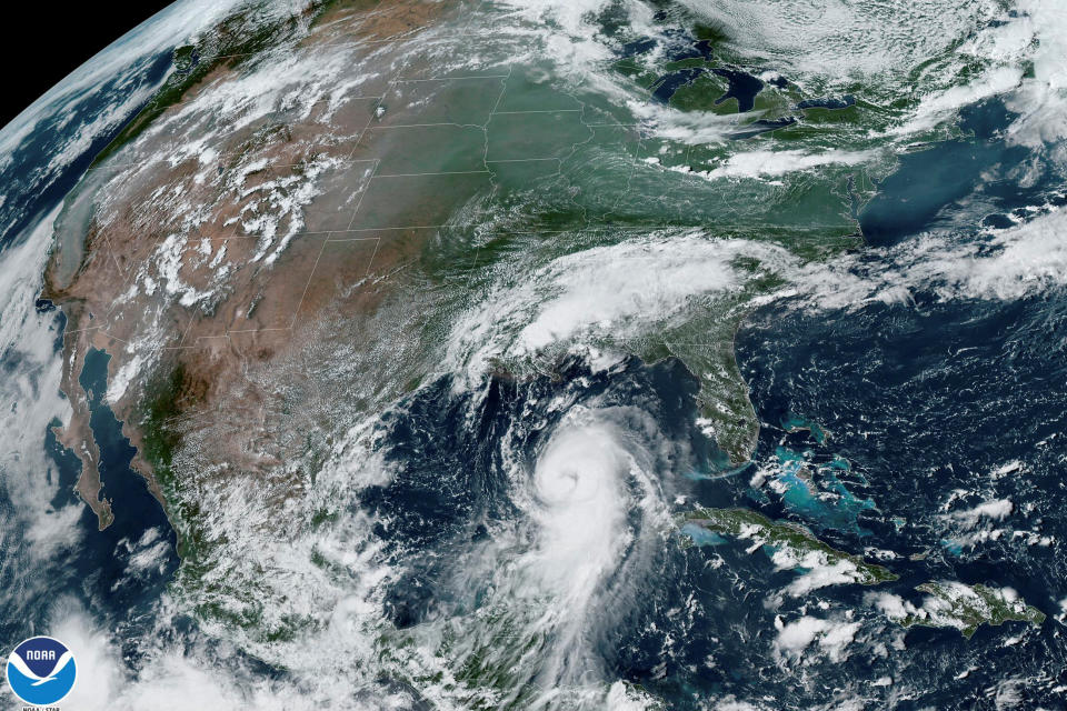 Hurricane Laura approaches the coasts of Texas and Louisiana in an image from the National Oceanic and Atmospheric Administration (NOAA) GOES-East satellite.