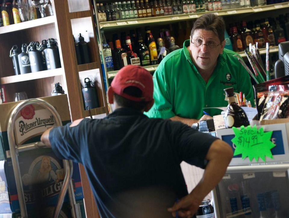 Store manager Jay Miller receives a delivery at the large Daddy's Liquor store in Hallandale Beach on April 5, 2011.