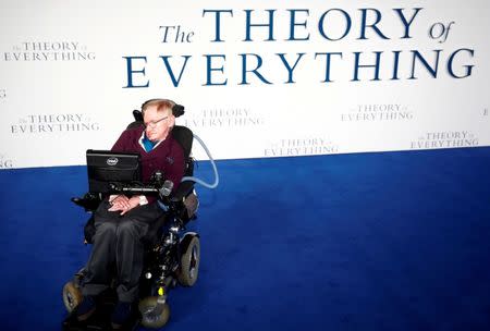 FILE PHOTO: Stephen Hawking arrives at the UK premiere of the film "The Theory of Everything" which is based around his life, at a cinema in central London, Britain, December 9, 2014. REUTERS/Andrew Winning/File Photo