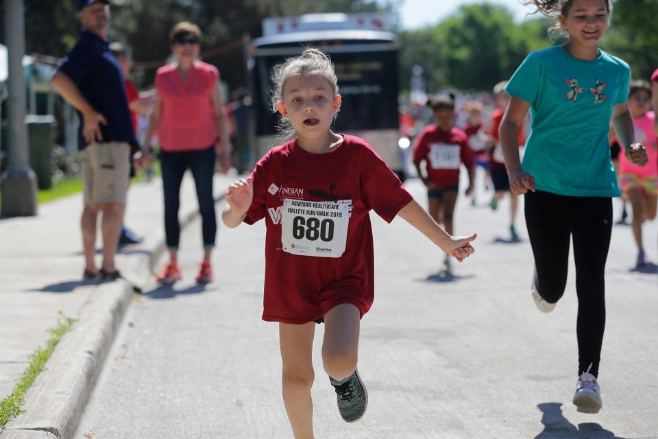 Kids 12 and under take part in the one mile run Saturday, June 8, 2019 at Lakeside Park during Walleye Weekend in Fond du Lac.