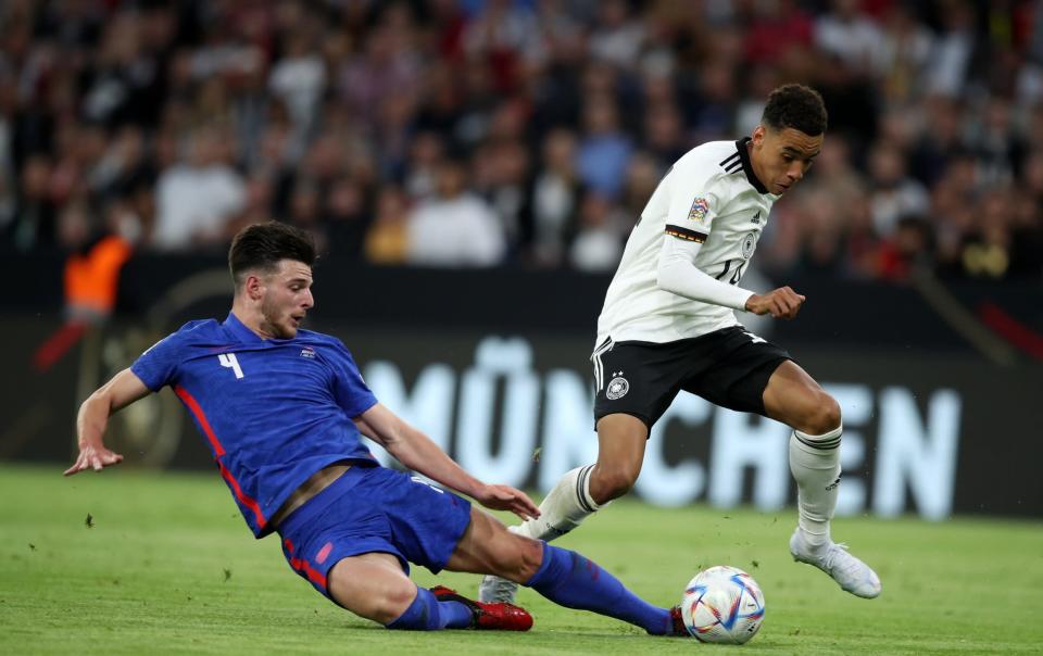 Jamal Musiala of Germany and Declan Rice of England during the UEFA Nations League League - GETTY IMAGES