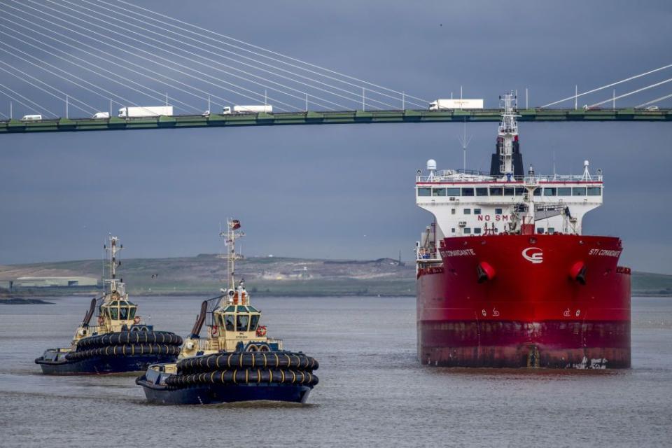 Tug boats escort the STI Comandante tanker after a delivery of Russian diesel to a fuel terminal in Purfleet, U.K., on April 5, 2022. (Chris J. Ratcliffe/Bloomberg via Getty Images