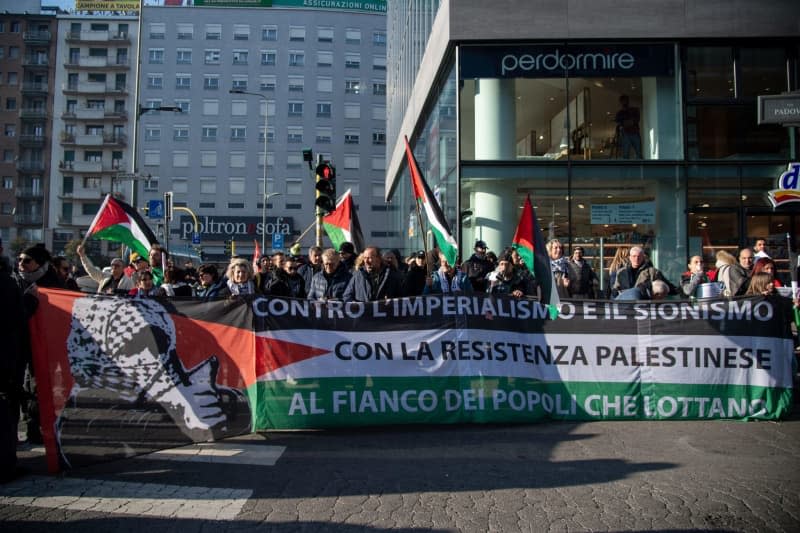 People protesting at a pro-Palestinian demonstration.Claudio Furlan/LaPresse via ZUMA Press/dpa