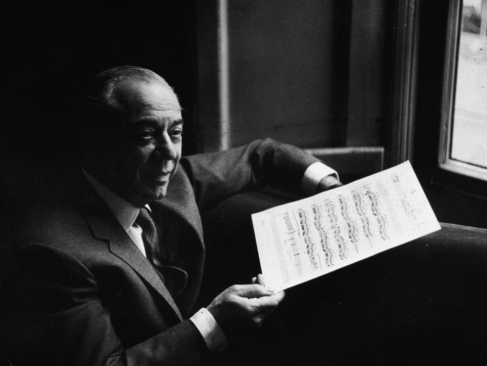 richard rodgers holds the musical score for 