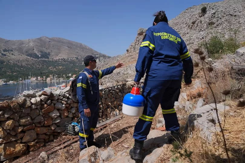 Search team in Symi, Greece, where a search and rescue operation is under way for TV doctor and columnist Michael Mosley