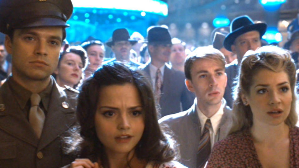 <p> Doctor Who fans will instantly recognise Jenna Coleman from her turn as the Time Lord&#x2019;s assistant Clara Oswald. She&#x2019;s a little harder to pick out in the first Captain America, though, as she&#x2019;s gone in a flash and only has a few lines. Coleman plays Bucky Barnes&#x2019; date, Connie, and appears very briefly during a scene at the Stark Expo. </p>