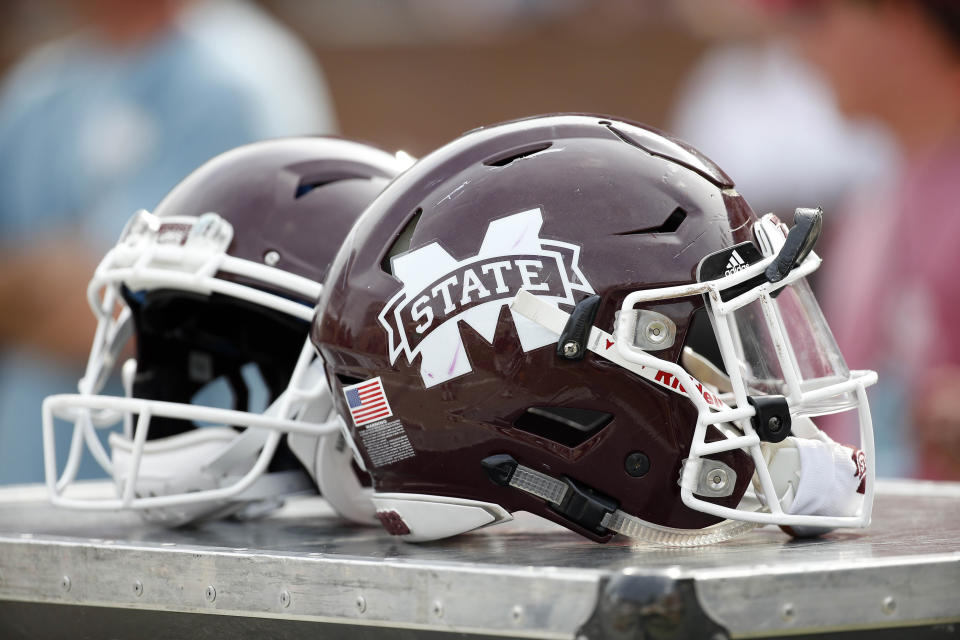 Players helmets sit on the sideline during the second half of Mississippi State's Maroon and White spring NCAA college football game, Saturday, April 21, 2018, in Starkville, Miss. The Maroon squad won 28-10. (AP Photo/Rogelio V. Solis)