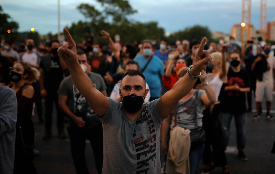 Protesters take part in a demonstration in the Vallecas neighborhood of Madrid against measures imposed by the Madrid regional government on areas with the most COVID-19 cases on Sept. 20. (Photo: Anadolu Agency via Getty Images)