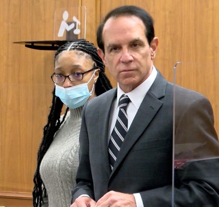 Monique Moore is shown with her attorney Michael Chazen during her trial Tuesday, March 15, 2022, in State Superior Court in Freehold.   Moore is on trial before Judge Jill O'Malley for the 2016 stabbing murder in Neptune of Joseph Wilson, Jr. 
