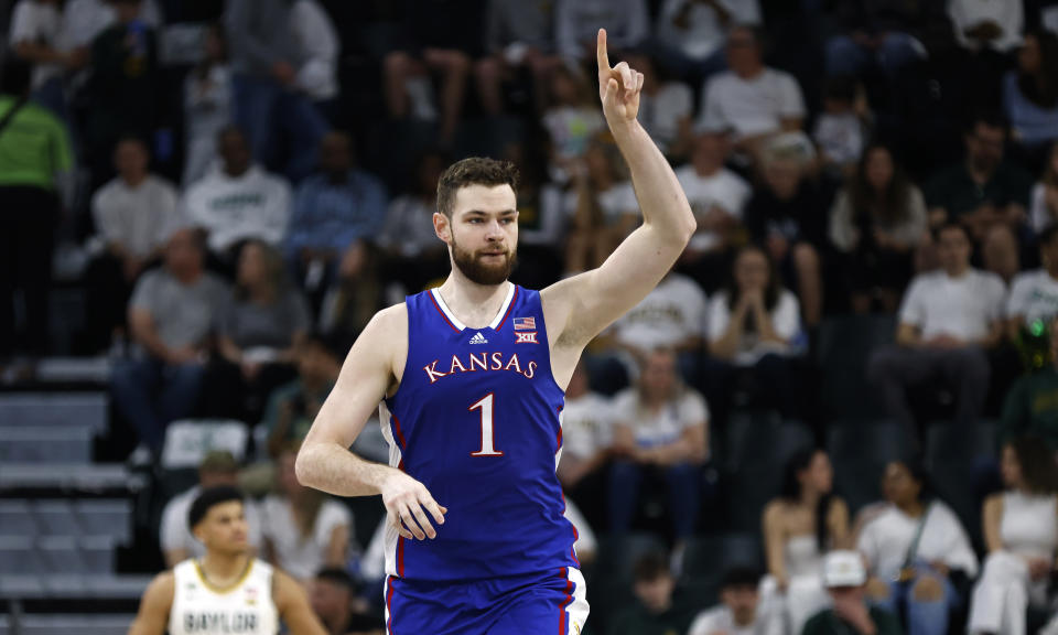 WACO, TEXAS - MARCH 2: Hunter Dickinson #1 of the Kansas Jayhawks reacts after his slam dunk in the first half against the Baylor Bears on March 2, 2024 at Foster Pavilion in Waco, Texas.  (Photo by Ron Jenkins/Getty Images)