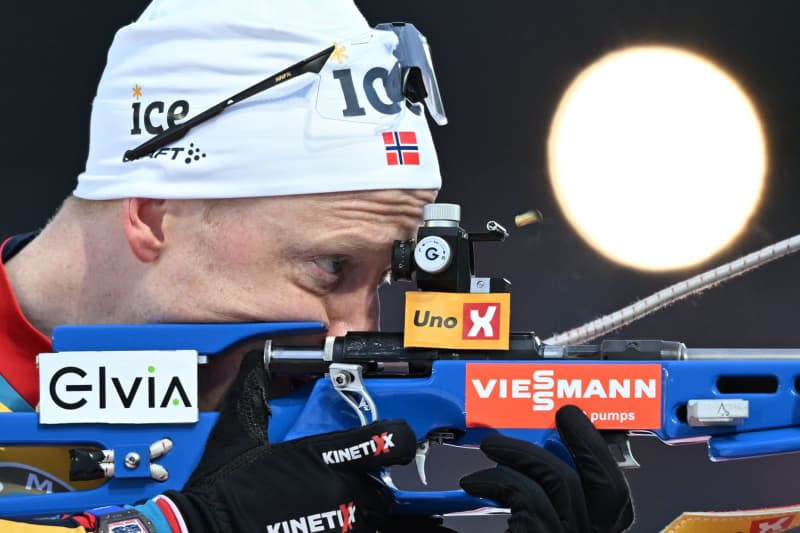 Norway's Johannes Thingnes Boe in action at the shooting range during the Men's 20 km individual event of the IBU Biathlon World Championships in Nove Mesto. Hendrik Schmidt/dpa