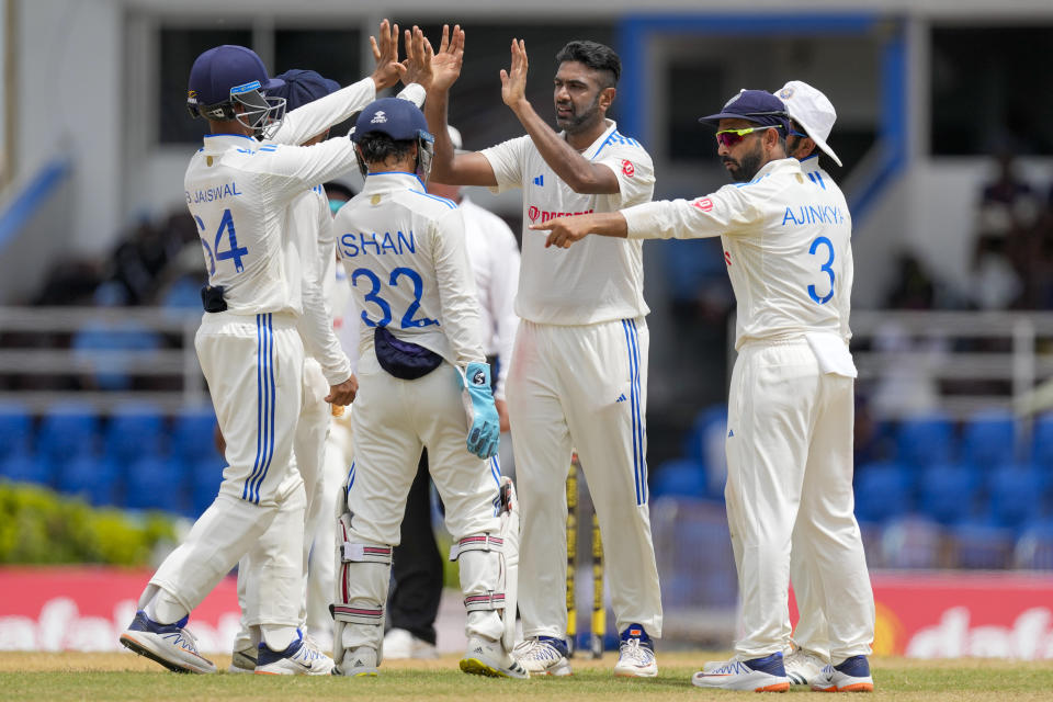 India's Ravichandran Ashwin celebrates with teammates after he bowled West Indies' capitan Kraigg Brathwaite on day three of their second cricket Test match at Queen's Park in Port of Spain, Trinidad and Tobago, Saturday, July 22, 2023. (AP Photo/Ricardo Mazalan)