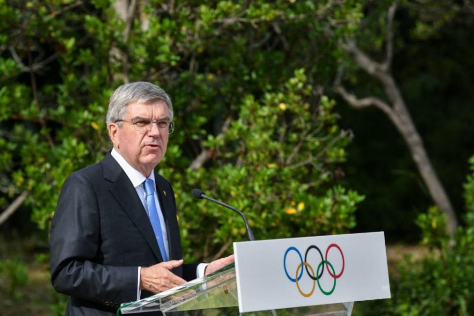 President of the International Olympic Committee (IOC) Thomas Bach speaks during a ceremony of the 100-year anniversary of the IOC Executive Board at the monument of Pierre de Coubertin, the founder of the International Olympic Committee, at the Olympic Academy in Ancient Olympia, birthplace of the ancient Olympics in southern Greece on October 17, 2021, a day before the flame-lighting ceremony for the Beijing 2022 Winter Olympics.<span class="copyright">Valerie Gache—AFP/Getty Images</span>