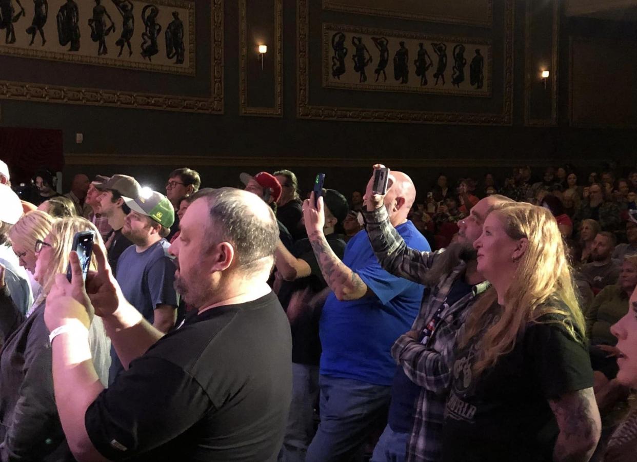 Concertgoers who paid extra to stand in historic Beacon Theatre's pit record Oliver Anthony during his 2024 Easter concert.