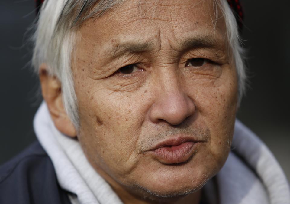 Shizuya Nishiyama, a 57-year-old homeless man from Hokkaido, speaks during an interview with Reuters at Sendai Station in Sendai, northern Japan