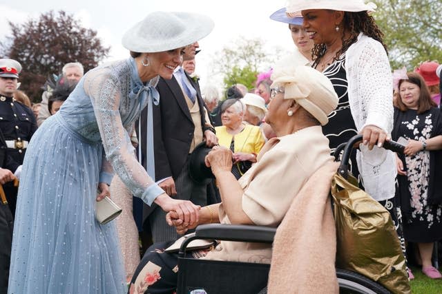 The Princess of Wales (left) speaks to Aldith Grandison, 93, and daughter Jay Cee La Bouche