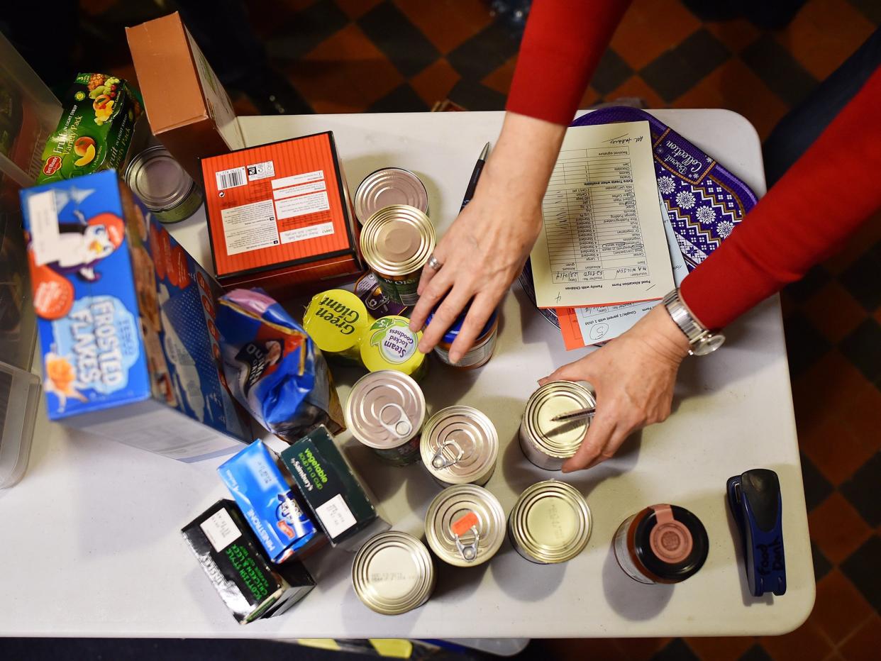 The number of people using food banks has risen by seven per cent in the last year: Getty