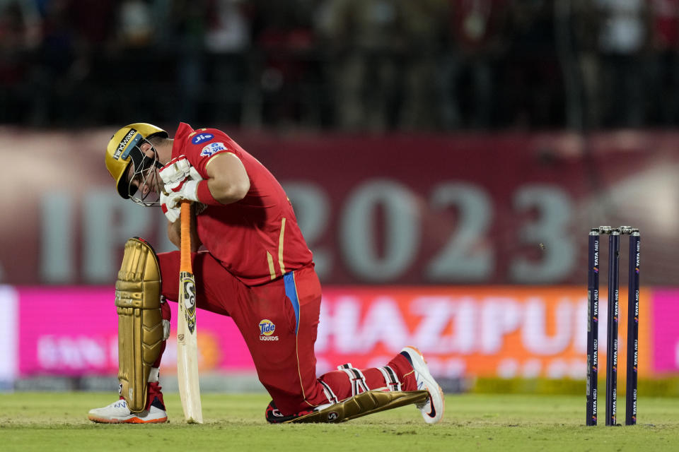 Punjab Kings' Liam Livingstone reacts after missing to play on a free-hit during the Indian Premier League cricket match between Punjab Kings and Delhi Capitals in Dharamshala, India, Wednesday, May 17, 2023. (AP Photo/Ashwini Bhatia)