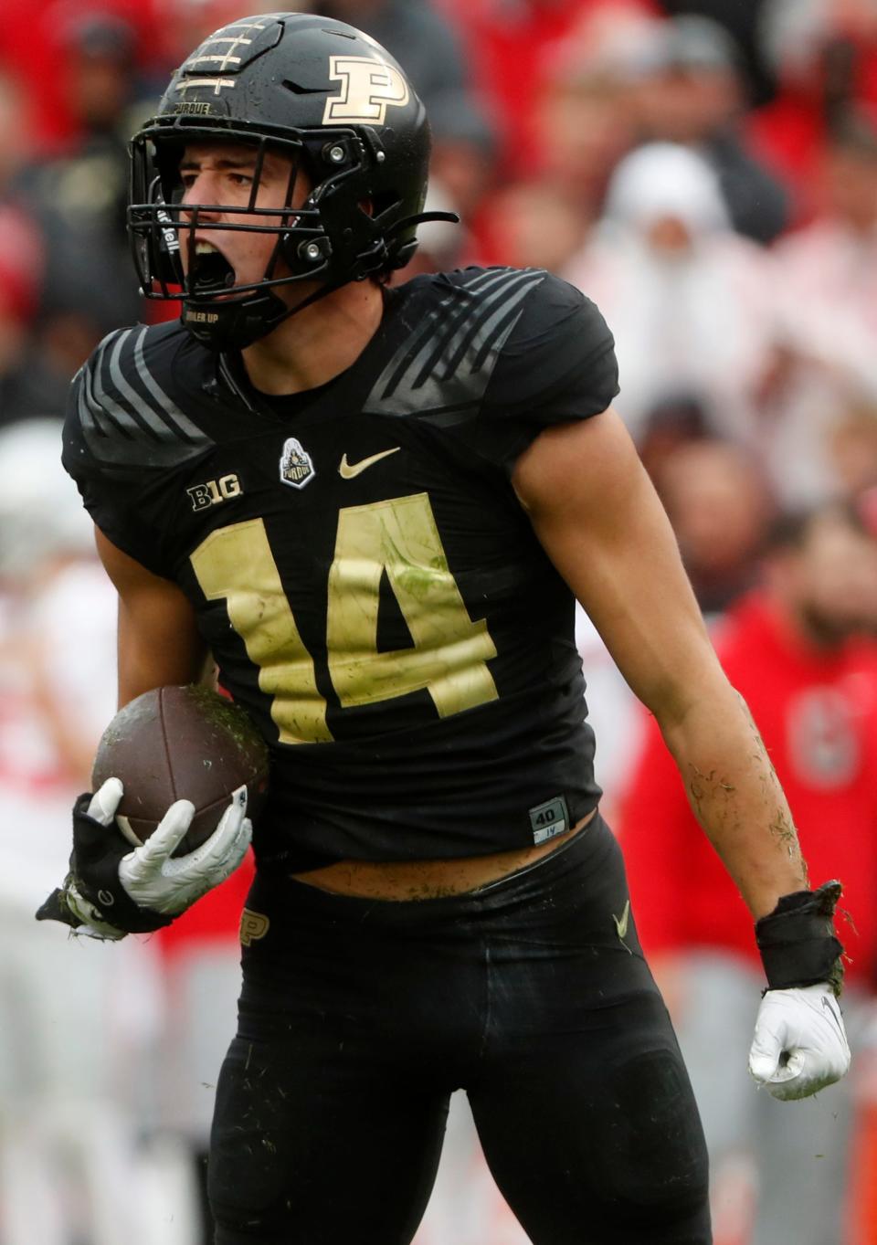 Purdue Boilermakers linebacker Yanni Karlaftis (14) reacts after recovering a fumble during the NCAA football game against the Ohio State Buckeyes, Saturday, Oct. 14, 2023, at Ross-Ade Stadium in West Lafayette, Ind. Ohio State Buckeyes won 41-7.