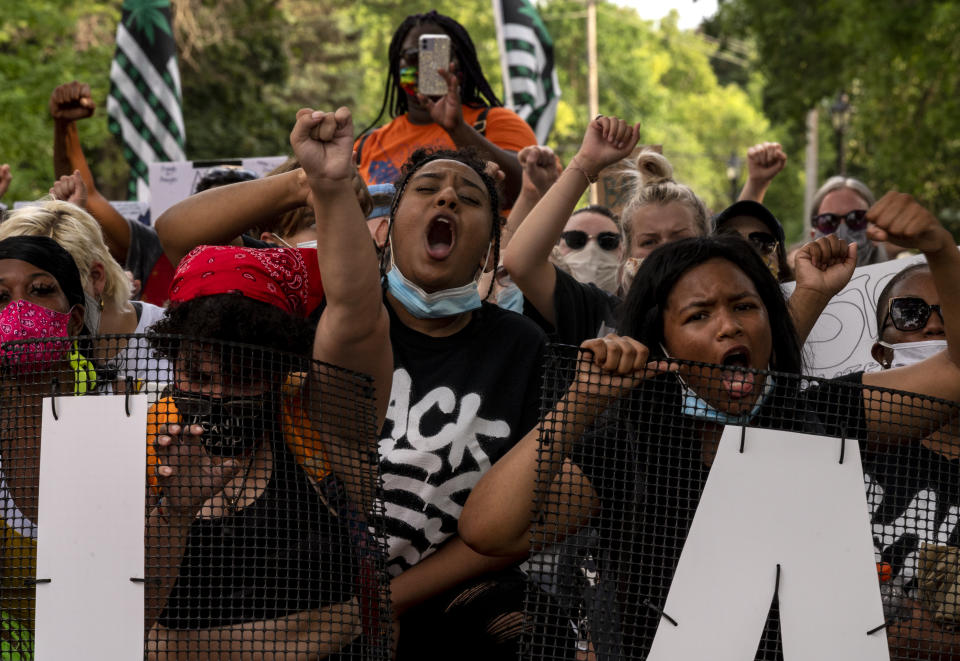 ST. ANTHONY, MN - JULY 06: Demonstrators march in honor of Philando Castile on July 6, 2020 in St. Anthony, Minnesota. Philando Castile was shot and killed during a traffic stop by Jeronimo Yanez, an officer with the St. Anthony Police Department, four years ago on July 6, 2016. (Photo by Stephen Maturen/Getty Images)