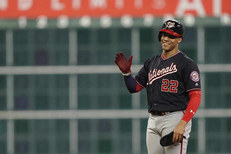 Washington Nationals' Juan Soto reacts after hitting a two-run scoring double during the fifth inning of Game 1 of the baseball World Series against the Houston Astros Tuesday, Oct. 22, 2019, in Houston. (AP Photo/David J. Phillip)