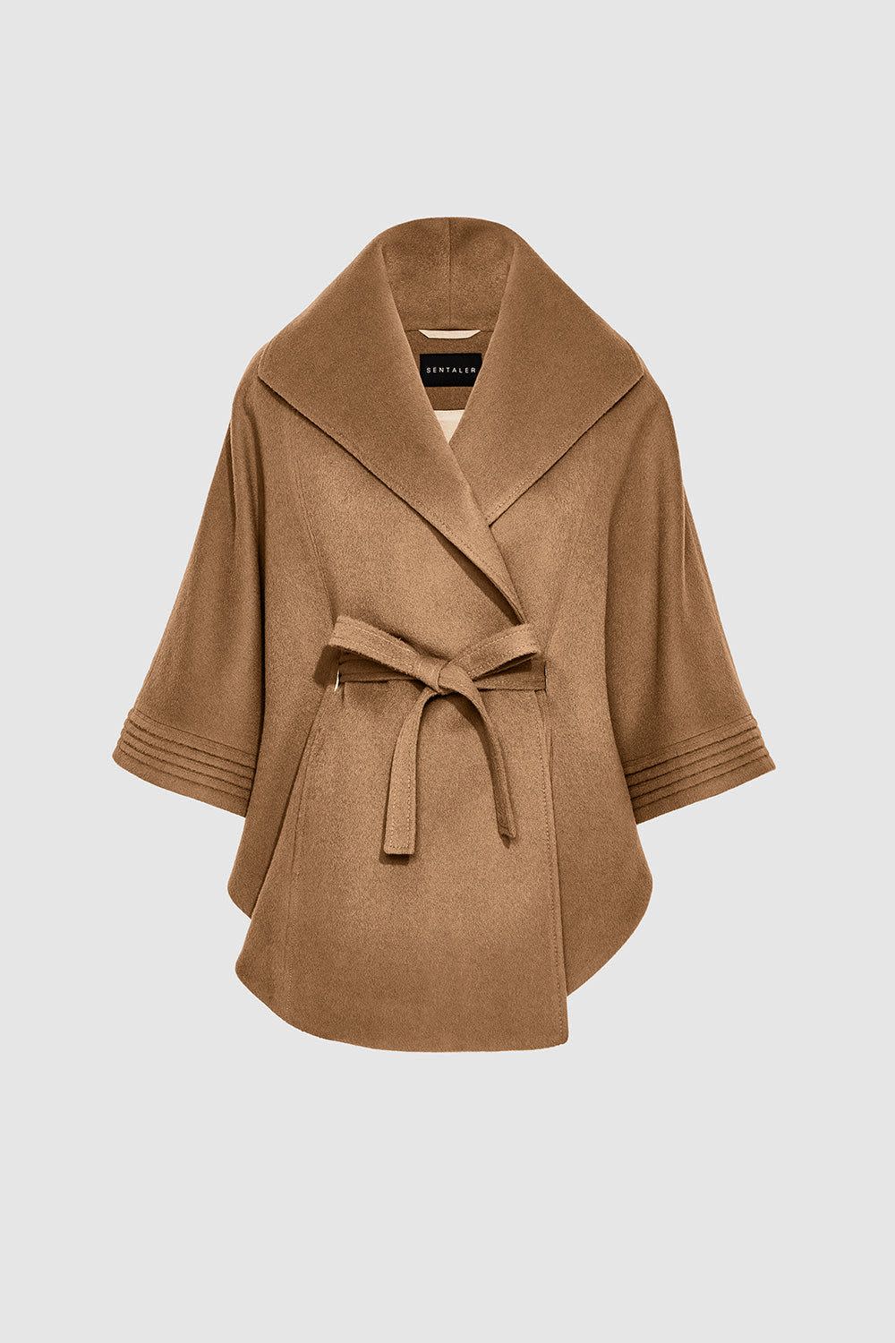 <p><a href="https://sentaler.com/products/cape-with-shawl-collar-and-belt-dark-camel" rel="nofollow noopener" target="_blank" data-ylk="slk:Shop Now;elm:context_link;itc:0;sec:content-canvas" class="link rapid-noclick-resp">Shop Now</a></p><p>Cape with Shawl Collar and Belt</p><p>sentaler.com</p><p>$1295.00</p>