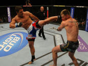 LAS VEGAS, NV - MAY 26: Shane Del Rosario (L) kicks Stipe Miocic during a heavyweight bout at UFC 146 at MGM Grand Garden Arena on May 26, 2012 in Las Vegas, Nevada.