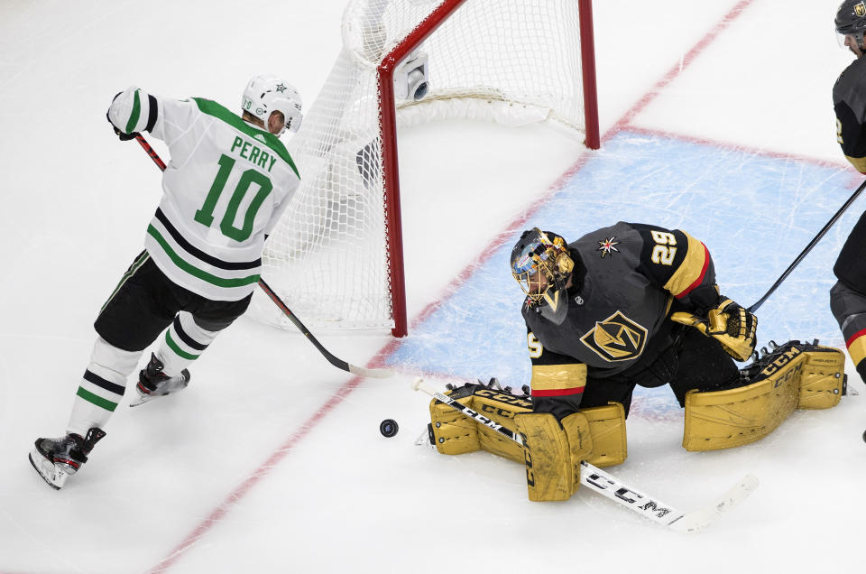 Vegas Golden Knights goalie Marc-Andre Fleury (29) stops Dallas Stars' Corey Perry (10) during the first period of Game 1 of an NHL Western Conference final hockey game, Sunday, Sept. 6, 2020 in Edmonton, Alberta. (Jason Franson/The Canadian Press via AP)