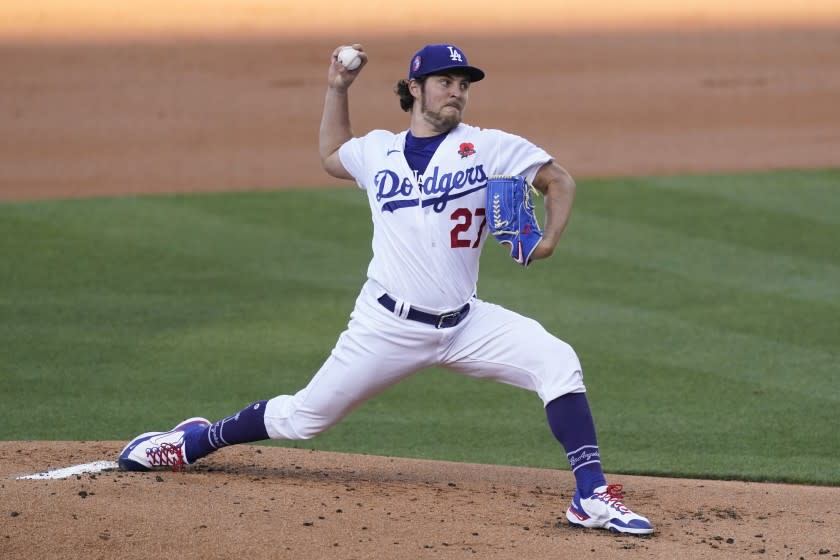 Los Angeles Dodgers starting pitcher Trevor Bauer (27) throws during the first inning.