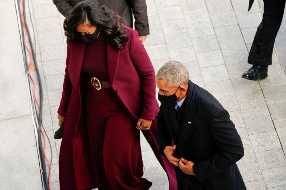 Former US President Barack Obama and former First lady Michele Obama arrive for the inaugurationPOOL/AFP via Getty Images