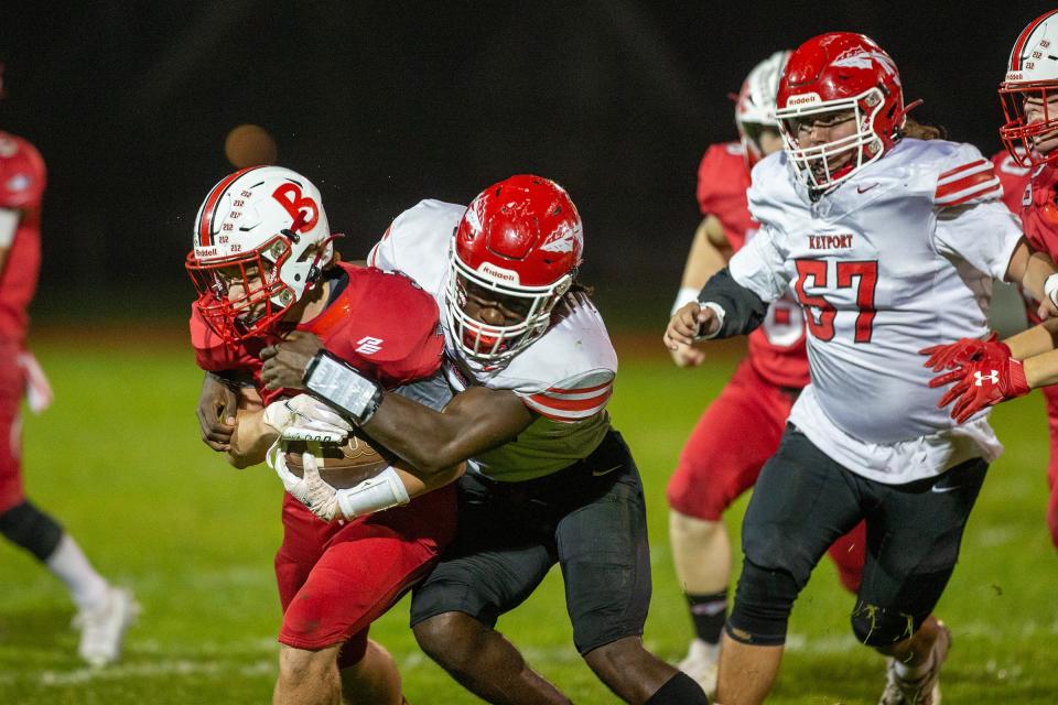 Point Pleasant Beach's Liam Brosnan is tackled by Keyport's Nazir Treadwell during the first half of the Keyport High School vs. Point Pleasant Beach High School football game at Donald T. Fioretti Field in Point Pleasant Beach, NJ Friday, October 6, 2023.