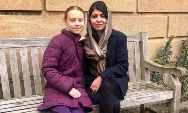 Power couple: Greta Thunberg and Malala Yousafzai, pictured at Lady Margaret Hall in Oxford yesterday