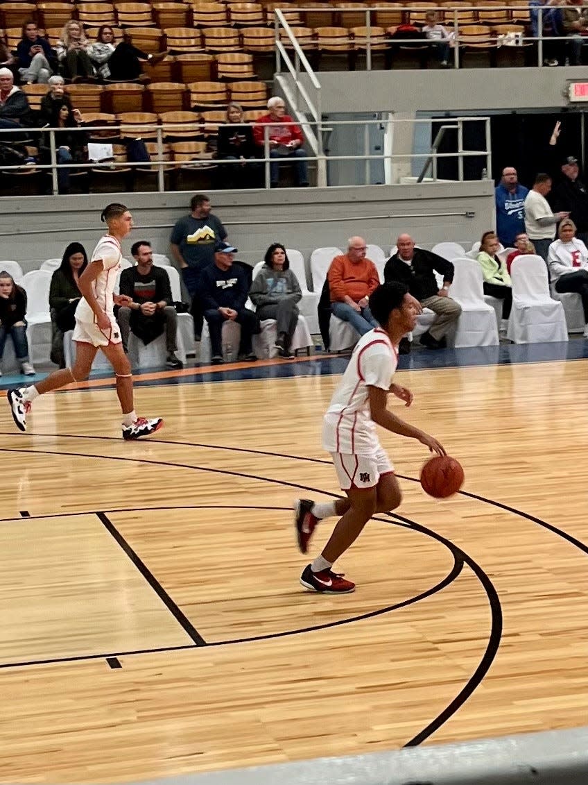 Marion Harding's Jayden Jones dribbles the ball up the court at this year's Coliseum Basketball Tip-Off.
