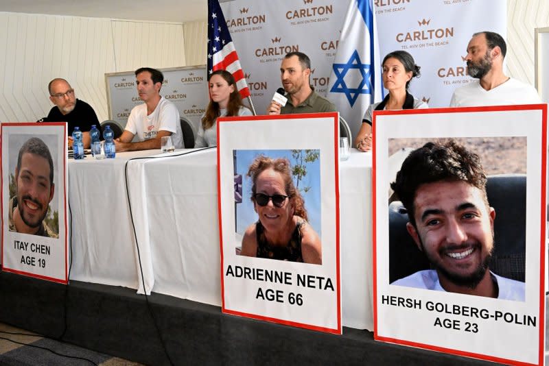 Israeli-American Gaza hostage Hersh Goldberg-Polin (pictured in sign at bottom right) appeared in a Hamas video Wednesday reading a statement that criticized Israeli Prime Minister Benjamin Netanyahu. A statement from his family said "Hersh's cry is the collective cry of all the hostages." File Photo by Debbie Hill/UPI