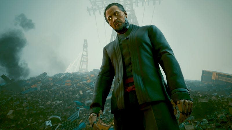 Goro Takemura stands above Cyberpunk 2077 protagonist V, who's been dumped in a scrap yard.