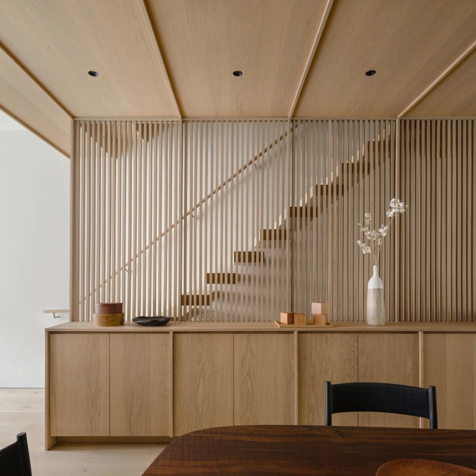 modern staircase with slatted walls