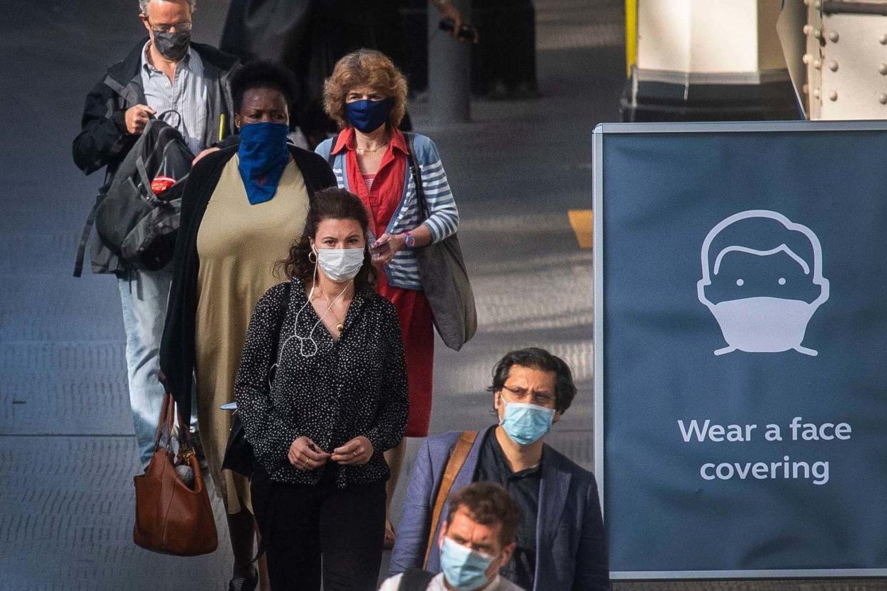 In the UK it has become mandatory to wear a face mask on public transport: PA