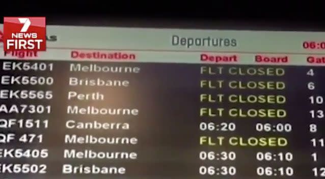 Travellers have been urged to check their flights before heading to the airport with a power outage causing delays. Photo: 7 News