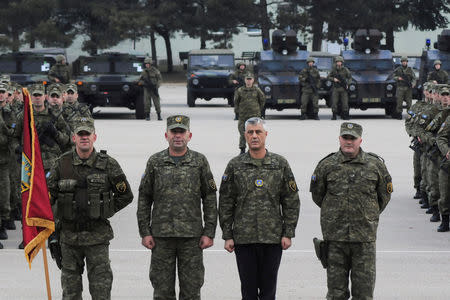 Kosovo's President Hashim Thaci attends a ceremony of security forces a day before parliament's vote on whether to form a national army, in Pristina, Kosovo, December 13, 2018. REUTERS/Laura Hasani