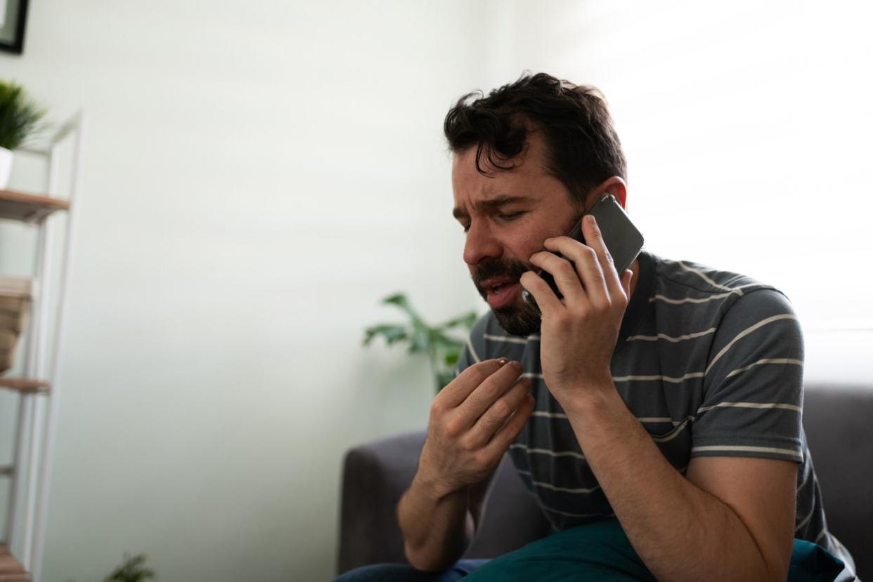 Distressed Upset Man on Phone