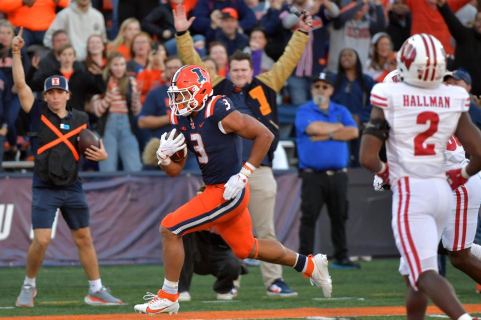 Oct 21, 2023; Champaign, Illinois, USA; Illinois Fighting Illini running back Kaden Feagin (3) scores a touchdown during the second half against the Wisconsin Badgers at Memorial Stadium. Mandatory Credit: Ron Johnson-USA TODAY Sports