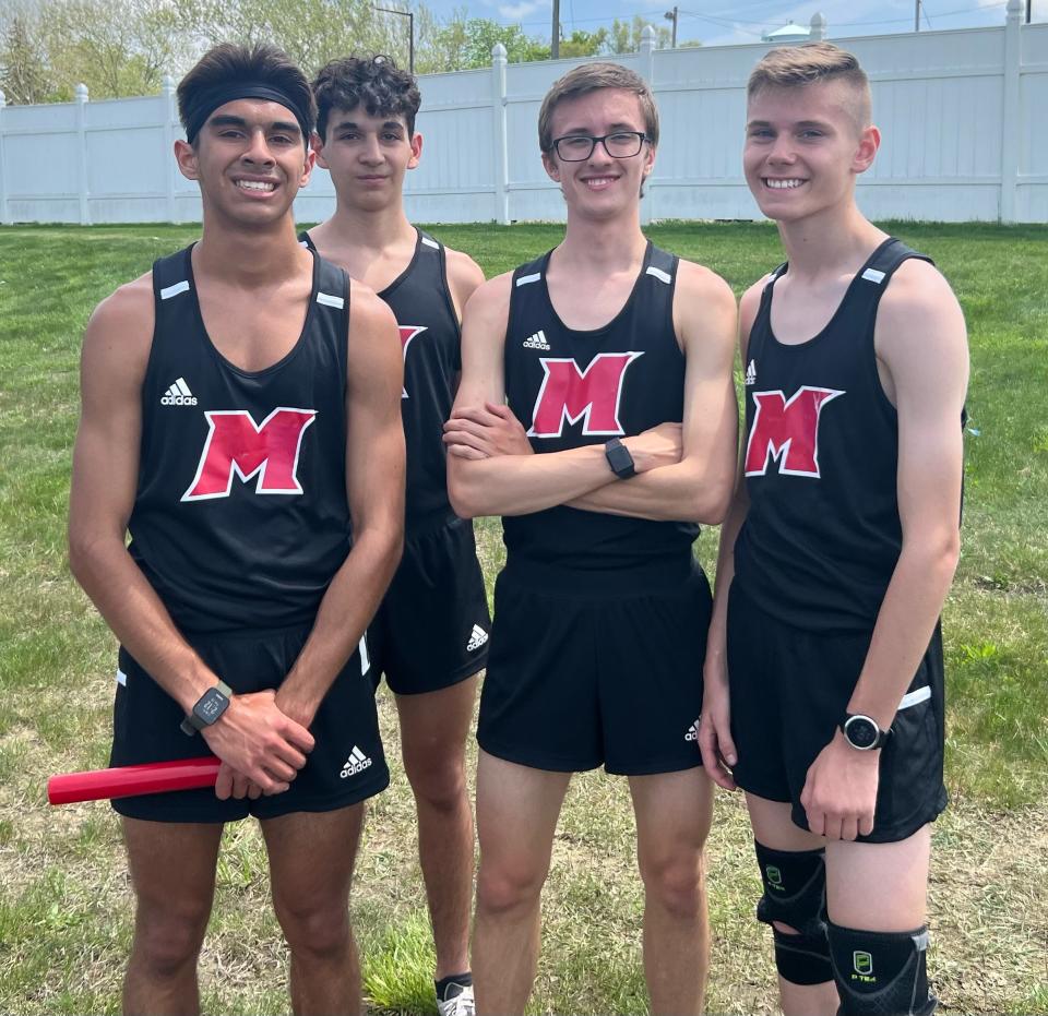 From left: Cardinal Mooney's Tyler Lenn, Jack Luzynski, Matthew Zammit Jr. and Isaac Zammit pose for a photo. The 4x800 relay team took first place in a Division 4 boys track & field regional on Thursday.