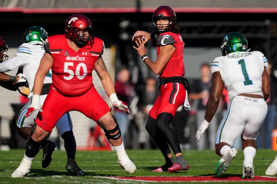 Cincinnati Bearcats quarterback Evan Prater (3) throws in the fourth quarter during their game against the Tulane Green Wave, Friday, Nov. 25.