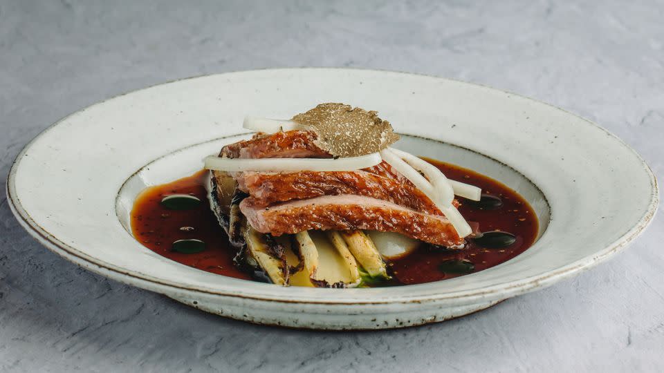 A dish of grilled duck and endive. - Courtesy Villa Frantzén Restaurant & Bar