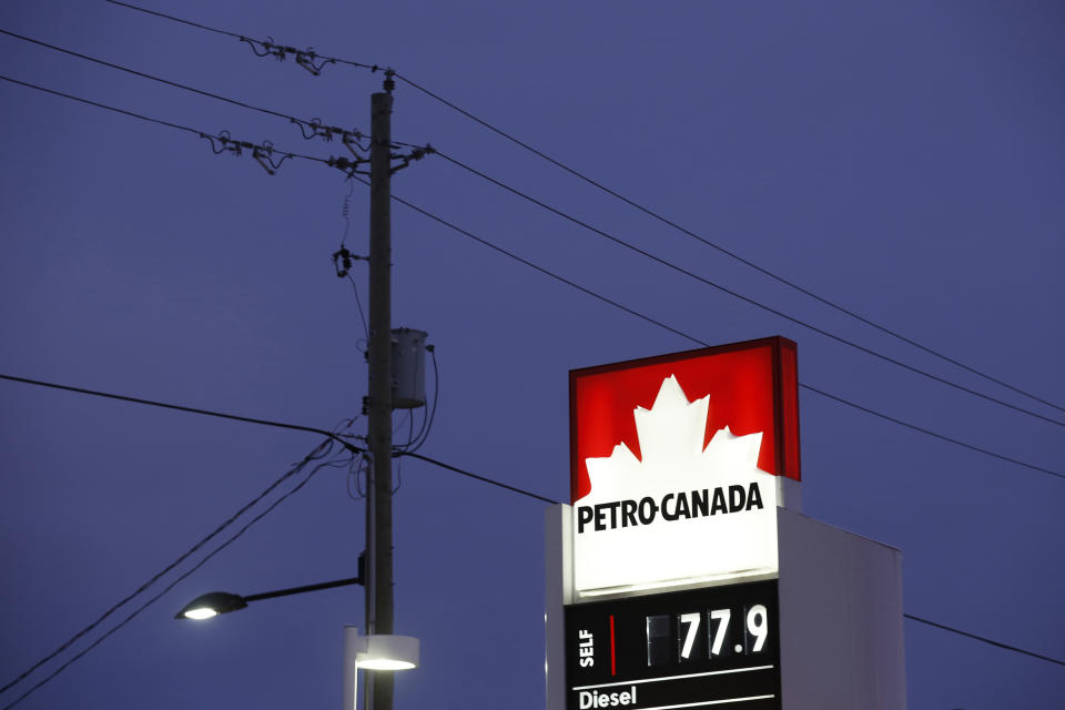 A Petro-Canada sign displays the price of unleaded gas at 77.9 cents CAD (55.7 cents USD) per litre in Ottawa, Canada, January 29, 2016. To match Wider Image/Global Oil price. REUTERS/Chris Wattie