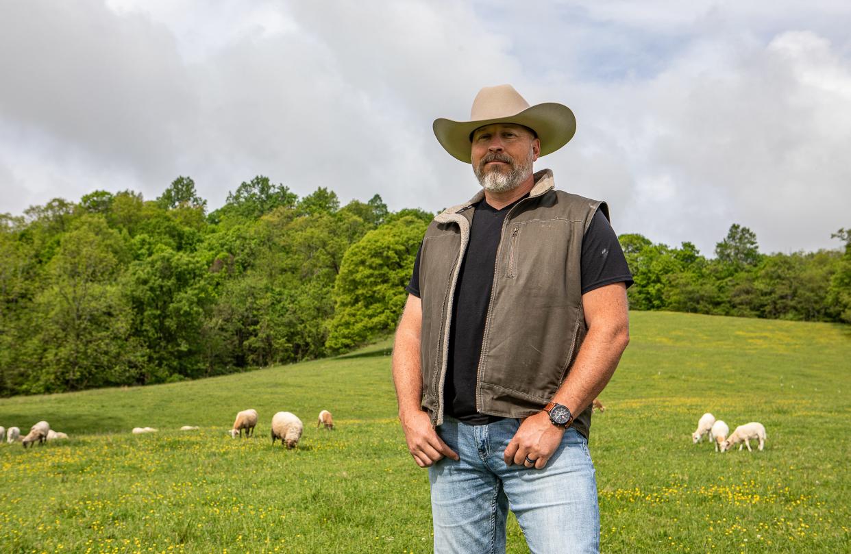 Republican candidate Aaron Reed stands for a photo on his farm in Shelbyville, Ky. Reed is running against Ed Gallrein and incumbent Adrienne Southworth in the May 21 Kentucky Primary Election for District 7. April 30, 2024